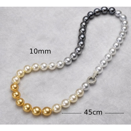 Naszyjnik z pereł w odcieniach szarości i złota – wyrazisty detal do stylowych stylizacji.