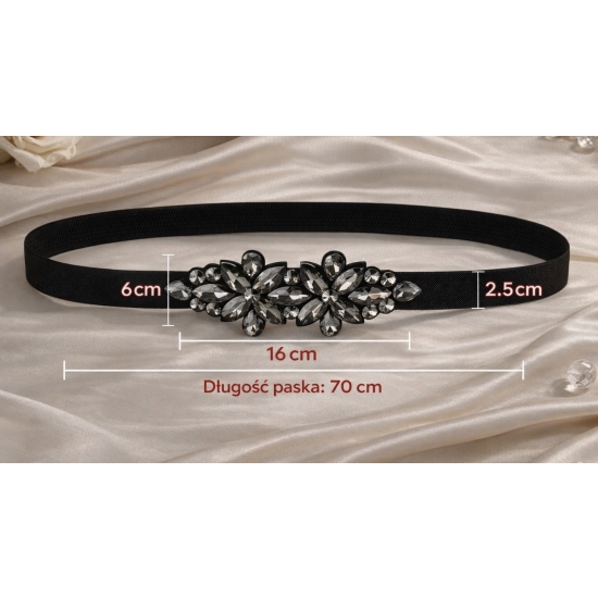 Elastyczny pasek z kryształową aplikacją – subtelna elegancja w nowoczesnym wydaniu.