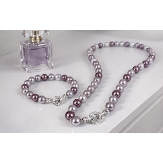 Komplet biżuterii z pereł – subtelna elegancja w ciepłej, kobiecej kolorystyce.