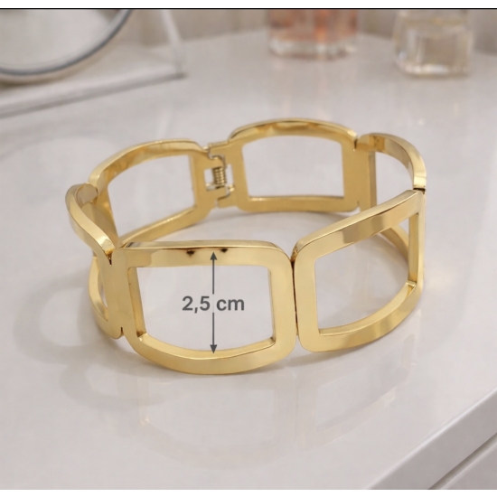 Geometryczny mankiet zaciskowy ze stali nierdzewnej w kolorze złotym – nowoczesny design i wygodny mechanizm.