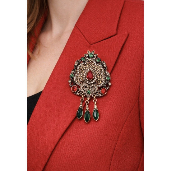 Broszka vintage z kamieniami – orientalny, biżuteryjny akcent.