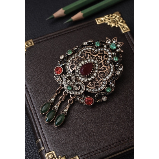 Broszka vintage z kamieniami – orientalny, biżuteryjny akcent.