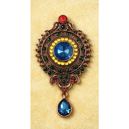 Broszka vintage – kolor, blask i charakter w jednym detalu.