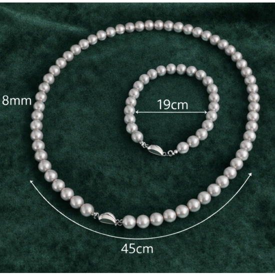 Zestaw biżuterii z jasnoszarymi perłami – naszyjnik + bransoletka.