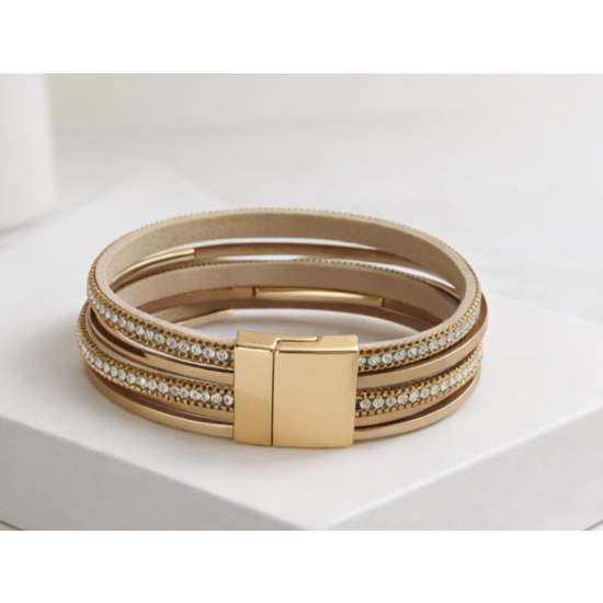 Bransoletka z cyrkoniami i złotymi obręczami – elegancki blask w nowoczesnym wydaniu.