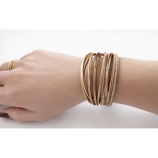 Bransoletka z cyrkoniami i złotymi obręczami – elegancki blask w nowoczesnym wydaniu.